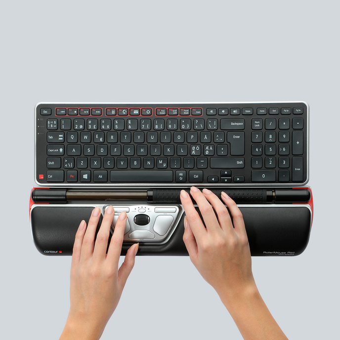 RollerMouse Red is placed in front your body alongside your keyboard to reduce unneessary strains